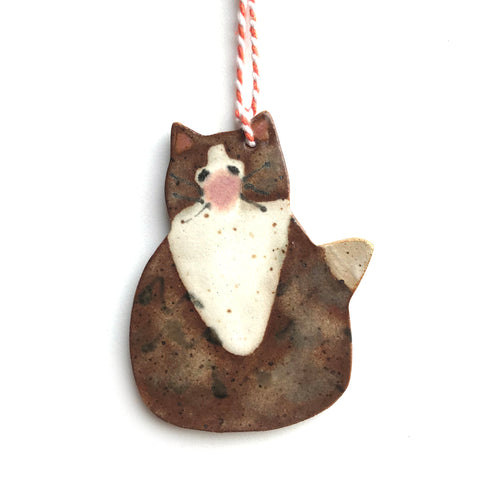 Mottled Brown White Bibbed Cat